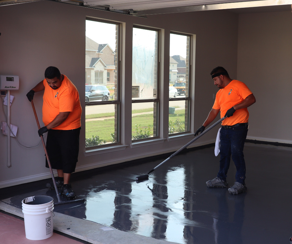 Installers replacing garage floor epoxy coating with Lifetime Green Coatings